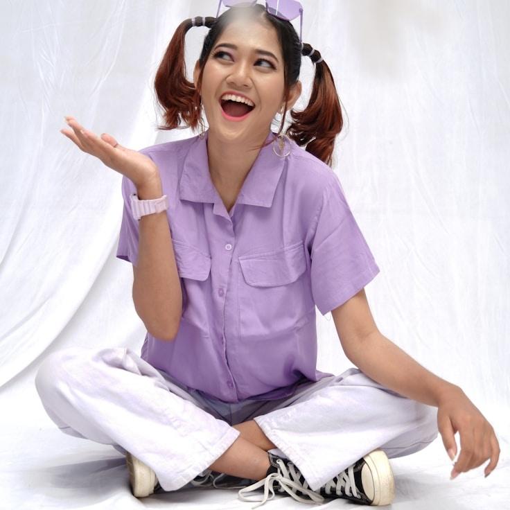 Amira Kapoor, Lead Design Curator at BlendHarborPro, reviewing corporate floral arrangements